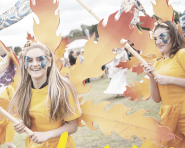 Young women at an opening ceremony