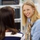 Two ladies talking and smiling